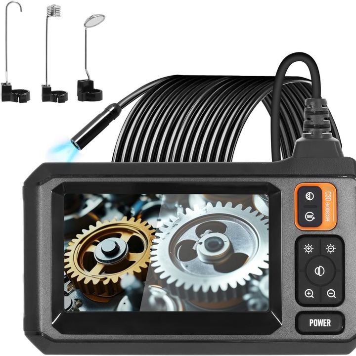 Inspection camera with a screen and a coiled cable